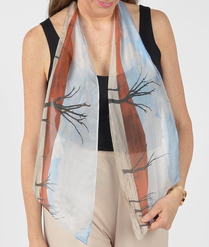 Desert scarf worn over a black top