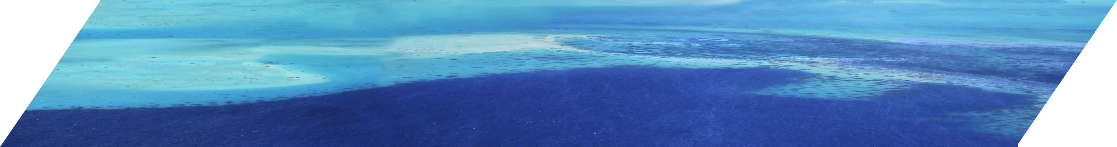 Ocean scarf print laid flat: turquoise shallows meeting deep blue water